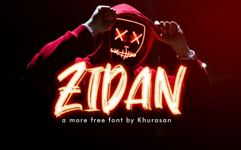 A man with hoodie and a hand brushed font written in neon red colorscary mask and a