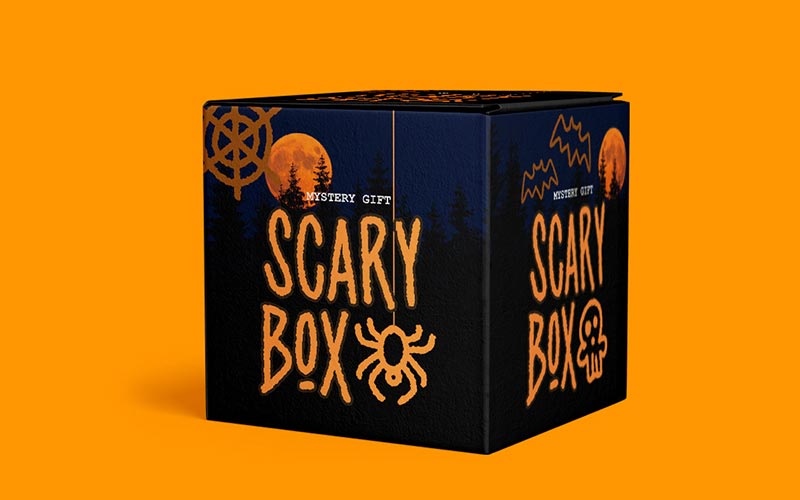 A giftbox with spider, spiderweb, and text giftwrap