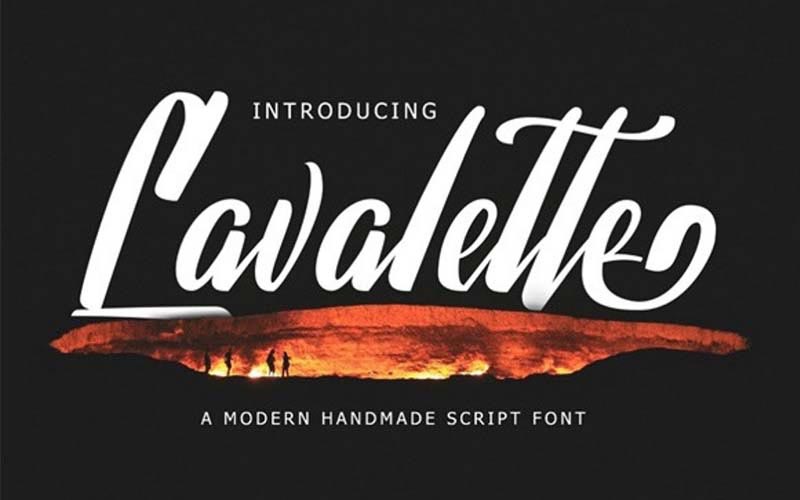 Lavalette font banner with people standing near a volcanic mountain's mouth