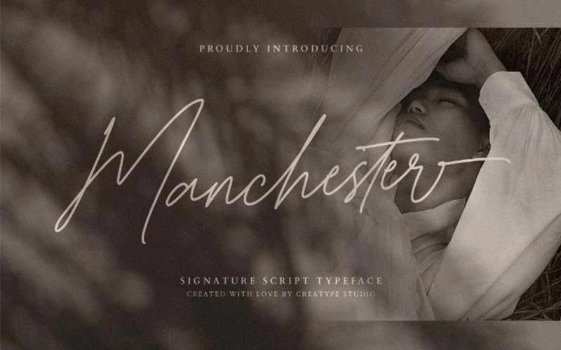 Manchester font banner with a lady wearing white attire posing