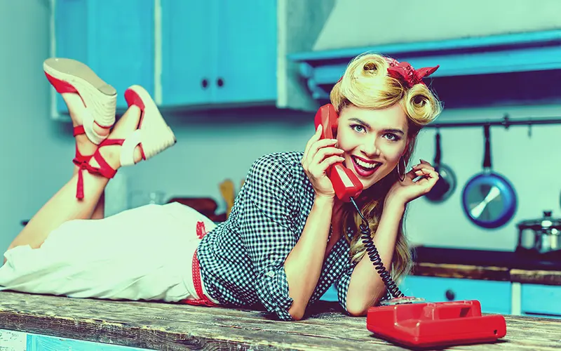 A Free Retro Photoshop Action Preview On An Image Of A Girl Talking On Phone