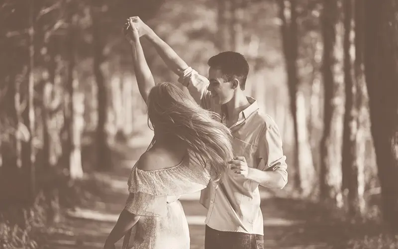 A Free Retro Photoshop Action Preview On An Image Of A Couple Dancing