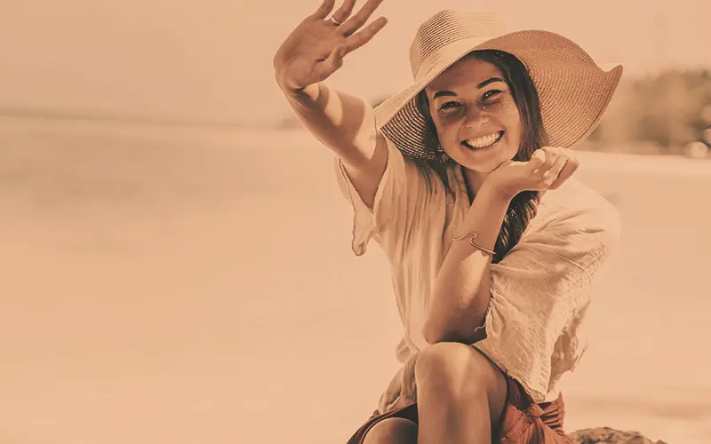 A Free Retro PhotoshopAction Preview On An Image Of A Smiling Woman